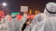  زیارت کادر درمان عراق با لباس مخصوص بیمارستان
